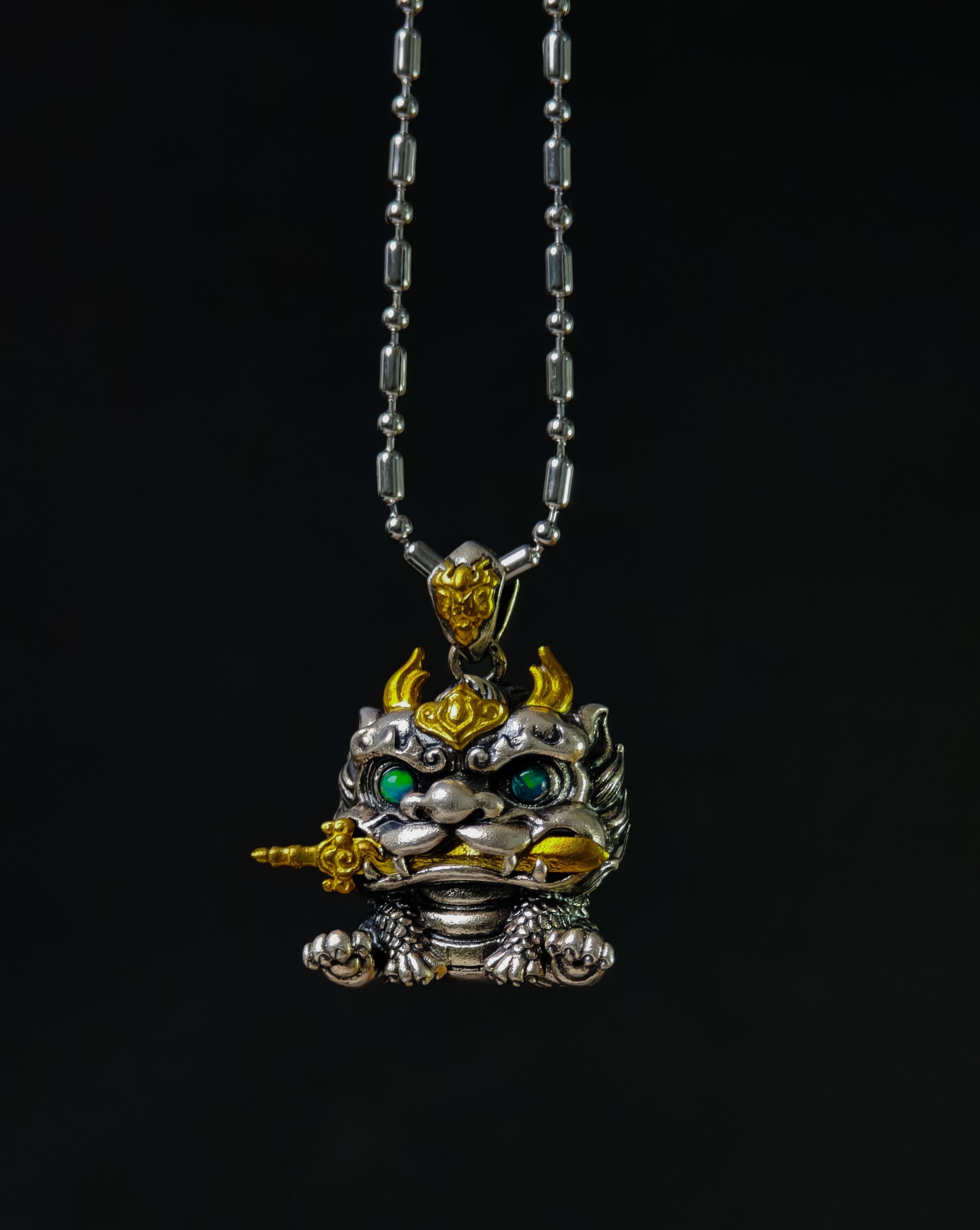 Symbolic silver pendant